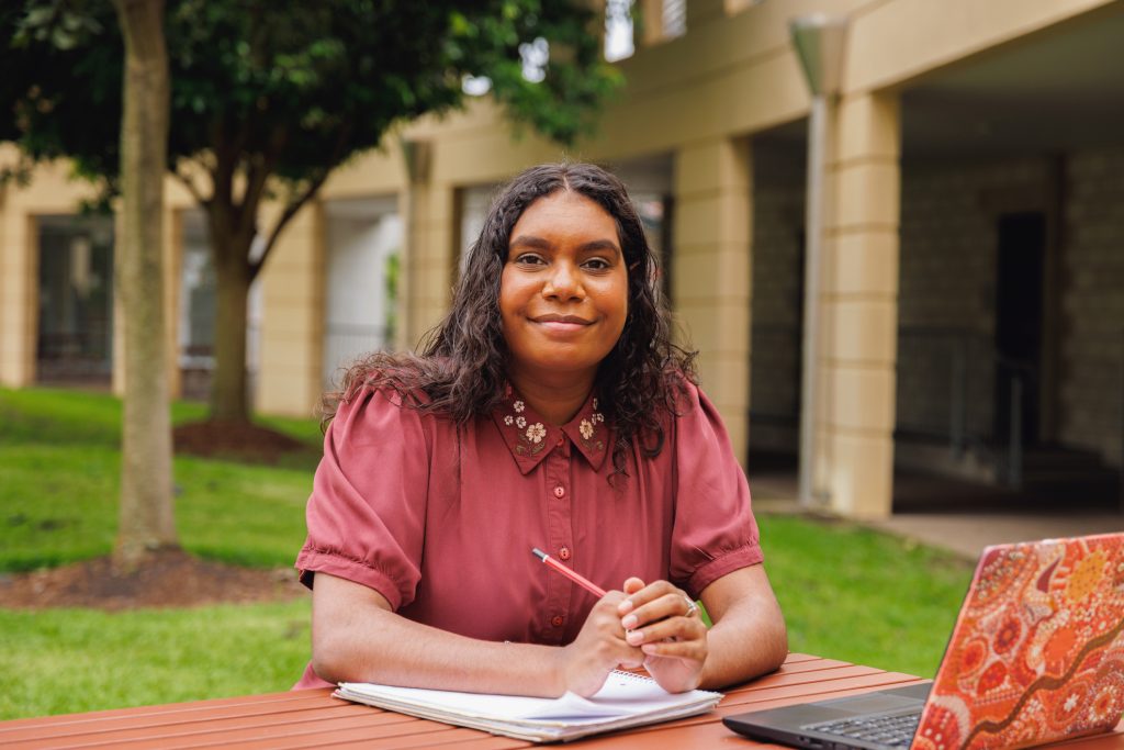 Portrait Of Female Aboriginal Australian Student On University Campus